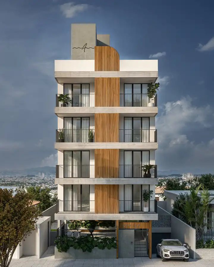 Fachada do Residencial INSPIRE à noite com iluminação moderna